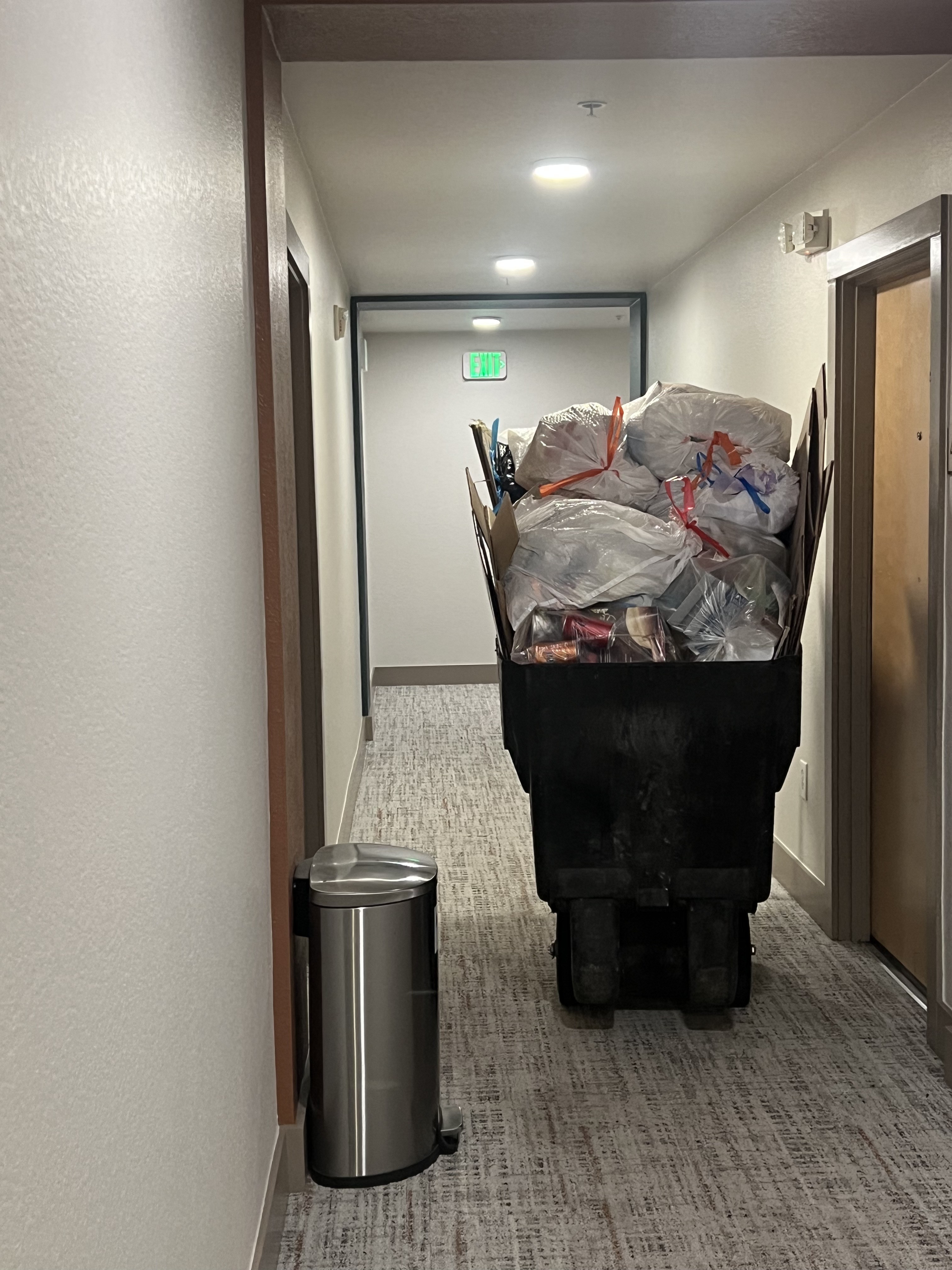 Before: apartment community with unmanaged waste and overflowing trash in common areas